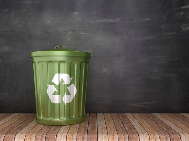 istock Trash Can with Recycling Symbol on Chalkboard Background - 3D Rendering 1181454136
