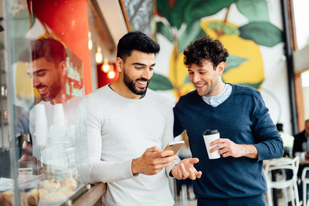 istock Friends Hanging Out in Coffee Shop 1181462921