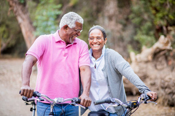 istock Senior African American Couple Riding Bikes 1181465616