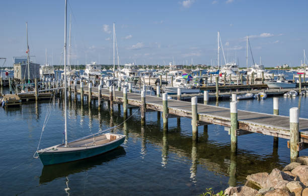 istock Small Sailboat at a New England Wharf 1181465658
