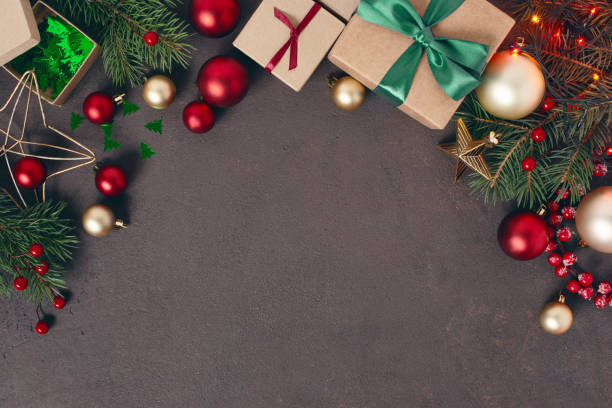 istock Festive background with Christmas decoration on the brown textured table 1181468896