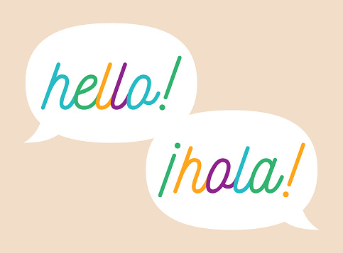 Language translation speech bubbles from English to Spanish.
