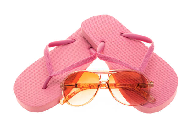 istock Pink flip flops and sunglasses 1181470927