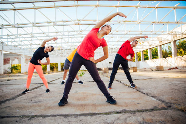 istock Group of athletes exercising 1181471895