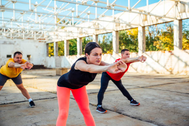 istock Group of people exercising 1181471936