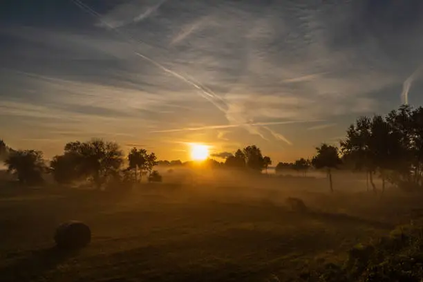 Color sunrise with fog on meadows near Pisek town in south Bohemia