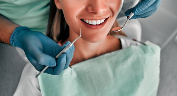 Stomatology Cropped shot of dentist examining teeth of beautiful female client. Healthy teeth concept. tooth whitening photos stock pictures, royalty-free photos & images