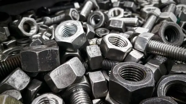 Photo of Nuts and screws made of stainless steel metal