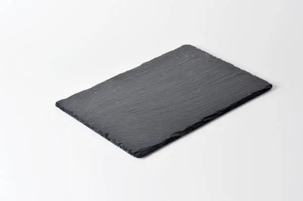 Photo of Black Stone Plate on White Background
