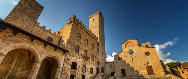 Photo of Piazza delle Erbe in the medieval town of San Gimignano, Tuscany, Italy