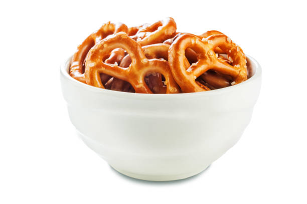 istock Pretzel with salt on a white isolated background 1181486705