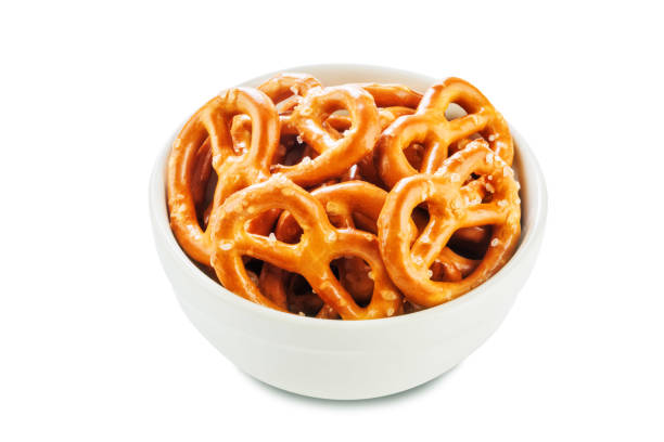 istock Pretzel with salt on a white isolated background 1181486721