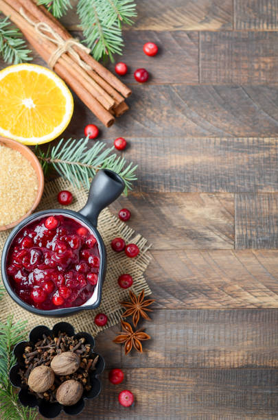 istock Cranberry sauce ingredients on a wooden background. 1181488620