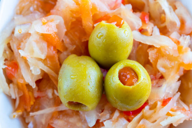 Sustainable living: Olives are pressed with salt and left to rest in a glass jar until they are ready to eat
