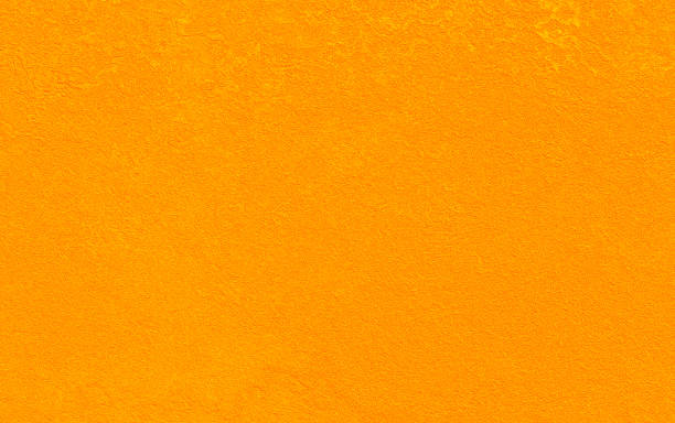 stuck orange gold gelb senf kürbis herbst sommer textur stein wand abstrakte hellen sandstein strand wüste hintergrund - stucco wall textured textured effect stock-fotos und bilder