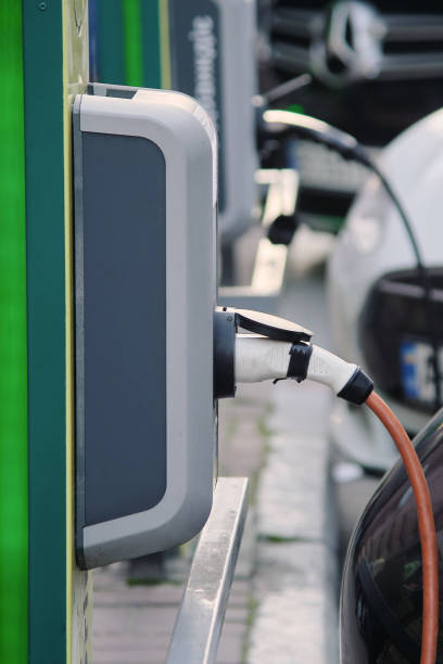 istock Refueling an electric car at a gas station 1181502805