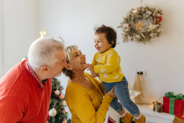 istock First Christmas with our granddaughter 1181504191