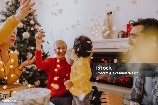 First Christmas With Our Baby Girl Stock Photo - Download Image Now - Christmas, Family, Fireplace
