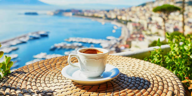 istock Cup of coffee with view on Vesuvius mount in Naples 1181507113