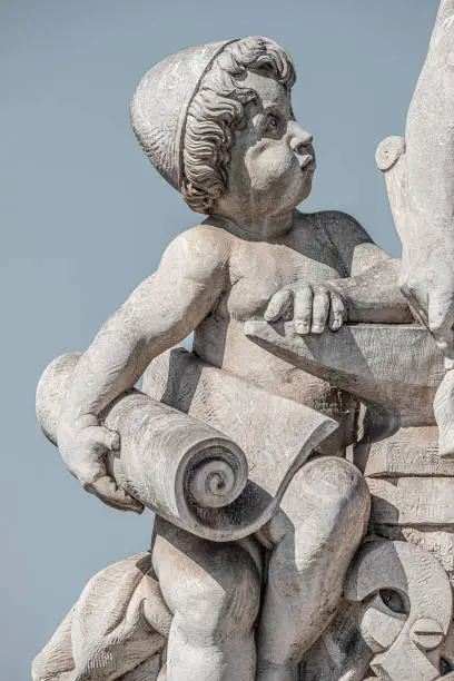 Photo of Sculpture of engineer and his scholar on Zoll Bridge in Magdeburg downtown at smooth gradient background, Germany, details, closeup