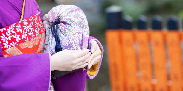 istock Maiko's hands holding the traditional bag 1181508051