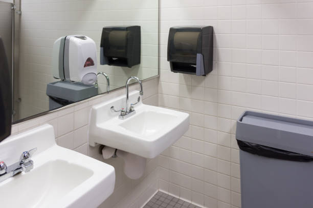 istock White porcelain sink in public restroom 1181508101