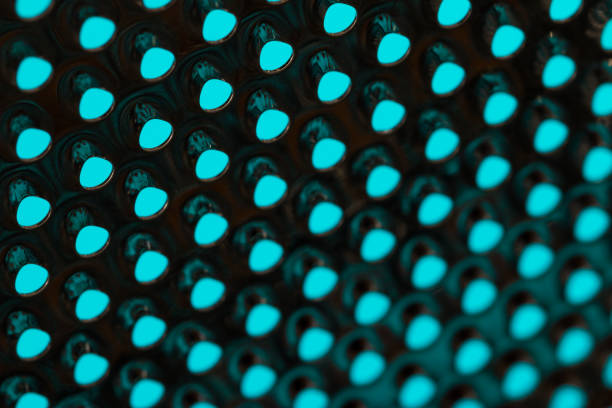 istock metal surface with holes on a grater 1181508202