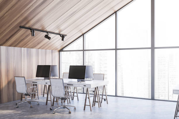 istock Wooden attic open space office corner 1181511575
