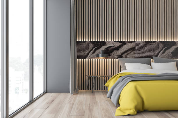 istock Wooden and gray panoramic bedroom interior 1181511585