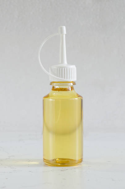 istock grease for accessories in a transparent bottle on a gray background 1181518245
