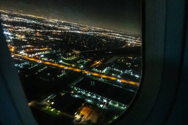 istock flying over chicago illinois at night 1181519959