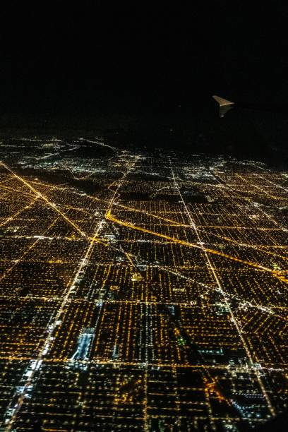 istock flying over chicago illinois at night 1181520009