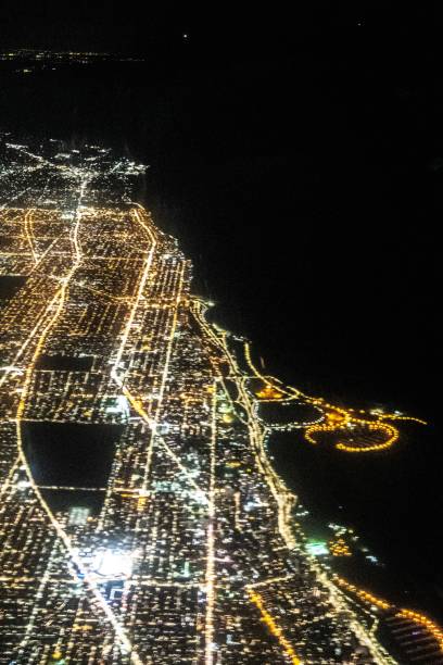 istock flying over chicago illinois at night 1181520333