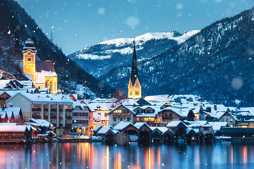 Tranquil snowy winter evening in idyllic Austrian village Hallstatt.
