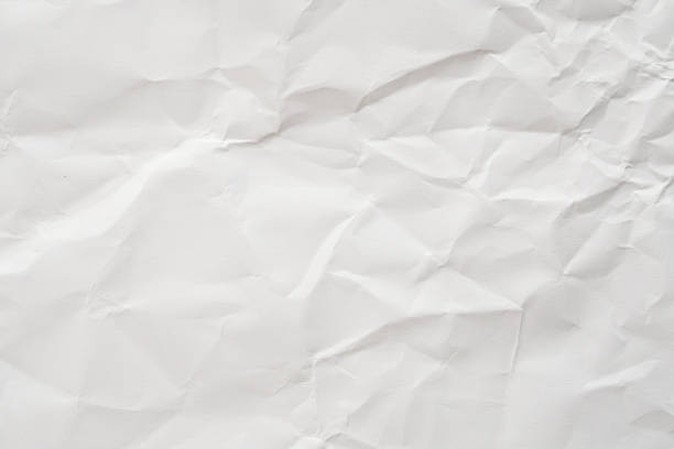 istock Abstract white crumpled paper texture background 1181522624