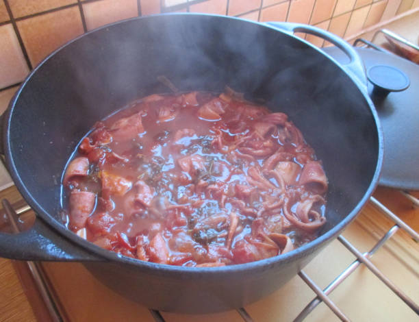 istock Squid being cooked in a casserole with an Armorican sauce 1181541280