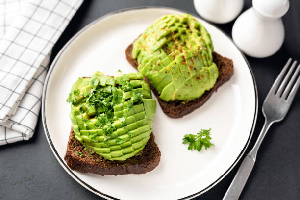 istock Avocado toast on white plate 1181546198