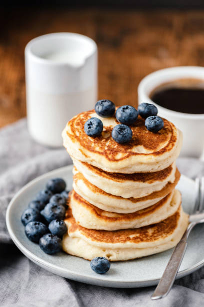 istock Breakfast pancakes with blueberries and cup of coffee 1181546253