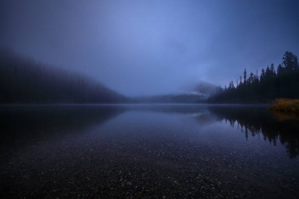 istock Darkness over lake in October 1181546279