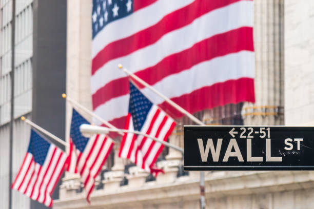 istock Wall Street and American flags 1181548598