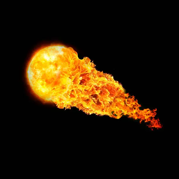 Photo of ball of fire isolated on black background