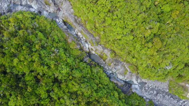 Zoom out over a river gorge
