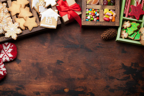 istock Christmas greeting card with gingerbread cookies and sweets 1181555745