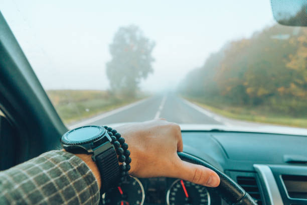 istock car travel concept man hand on steering wheel speedway copy space 1181556572