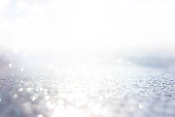 istock abstract glitter silver, gold lights background. de-focused 1181559551