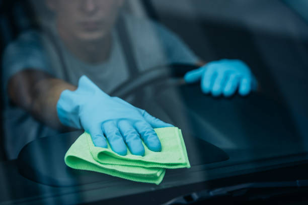 istock selective focus of car cleaner wiping dashboard near windshield 1181581302