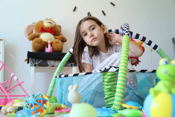 istock Girl playing in her room 1181584506