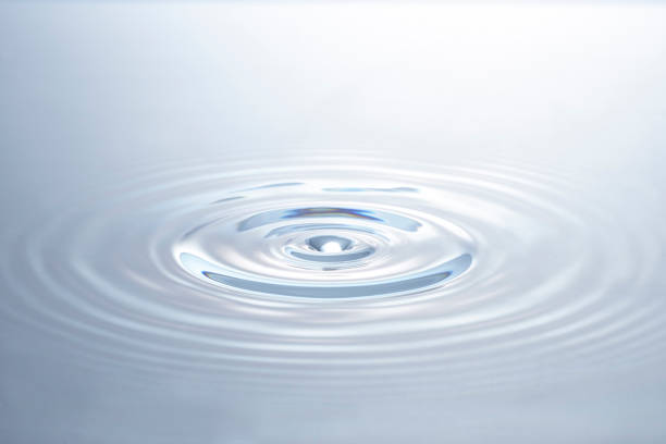 water ripples Water ripple at the moment of dropping water drops rippled stock pictures, royalty-free photos & images