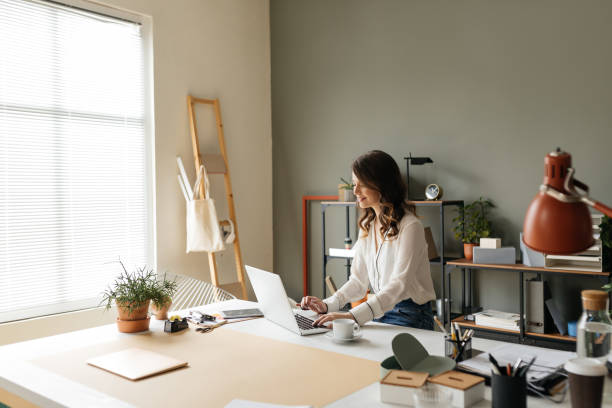 istock Businesswoman Enjoying Workin at her Office 1181585212