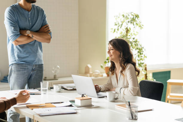 istock Colleagues Working Together at Office 1181585427